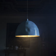 Load image into Gallery viewer, Bump LED Pendant Light in living room.
