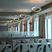 Load image into Gallery viewer, Cabildo LED Suspension Light in living room.
