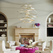 Load image into Gallery viewer, Calligraphy LED Pendant Light in living room.
