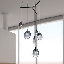 Load image into Gallery viewer, Cantina Tri-Spreader LED Pendant Light in living room.
