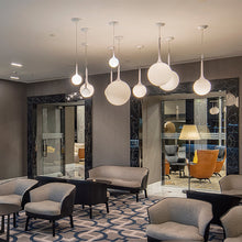 Load image into Gallery viewer, Castore Pendant Light in living room.
