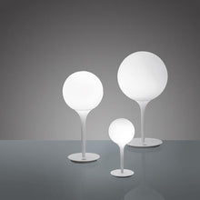 Load image into Gallery viewer, Castore Table Lamp in exhibition.

