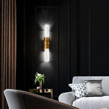 Load image into Gallery viewer, Ceres LED Wall Light in living room.
