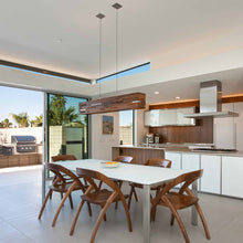 Load image into Gallery viewer, Aeris LED Linear Pendant Light in dining room.

