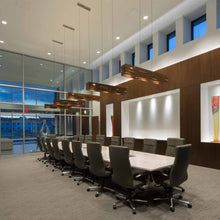 Load image into Gallery viewer, Aeris LED Linear Pendant Light in office.
