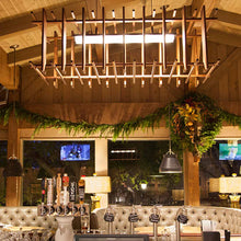 Load image into Gallery viewer, Arca LED Linear Pendant Light in restaurant.
