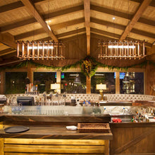 Load image into Gallery viewer, Arca LED Linear Pendant Light in restaurant.
