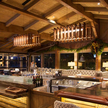 Load image into Gallery viewer, Arca LED Linear Pendant Light in restaurant.

