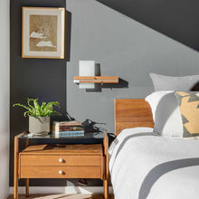 Load image into Gallery viewer, Levo LED Wall Light in bedroom.
