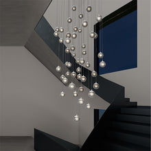 Load image into Gallery viewer, Champagne Bubbles LED Multi Light Pendant Light in living room.
