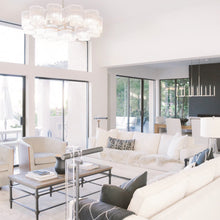 Load image into Gallery viewer, Circo Pendant Light in living room.

