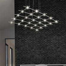 Load image into Gallery viewer, Constellation® Aquarius Medius LED Pedant Light in living room.
