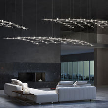 Load image into Gallery viewer, Constellation® Aquarius Medius LED Pedant Light in living room.
