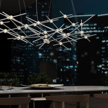 Load image into Gallery viewer, Constellation® Ursa Minor LED Pendant Light in dining room.
