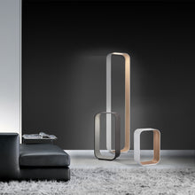 Load image into Gallery viewer, Contour LED Table Lamp in living room.
