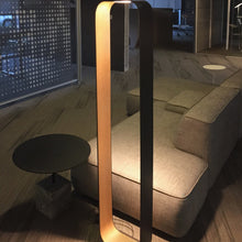 Load image into Gallery viewer, Contour LED Table Lamp in living room.
