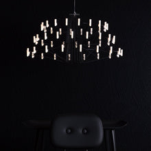 Load image into Gallery viewer, Coppelia LED Chandelier in dining room.
