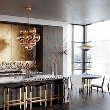 Load image into Gallery viewer, Adara Pendant Light in living room.
