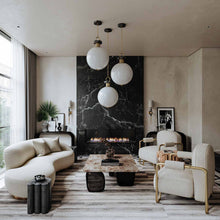 Load image into Gallery viewer, Solstice Wall Light in living room.
