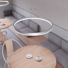 Load image into Gallery viewer, Corona Ring LED Pendant Light in restaurant.
