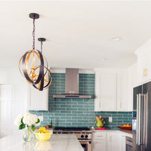 Load image into Gallery viewer, Luna Sphere Chandelier in dining room.
