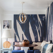 Load image into Gallery viewer, Luna Sphere Chandelier in living room.
