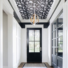Load image into Gallery viewer, Luna Sphere Chandelier in living room.
