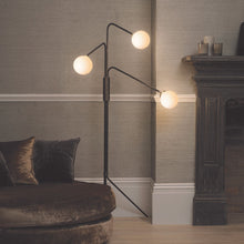 Load image into Gallery viewer, Array Opal Floor Lamp in living room.
