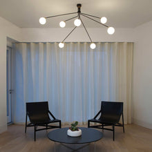 Load image into Gallery viewer, Array Opal Pendant Light in living room.

