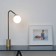 Load image into Gallery viewer, Array Opal Table Light in office.
