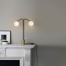 Load image into Gallery viewer, Array Twin Opal Table Light in living room.
