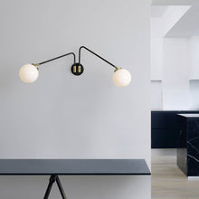 Load image into Gallery viewer, Array Twin Opal Wall Light in living room.
