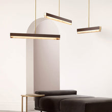 Load image into Gallery viewer, Artes LED Linear Pendant Light in living room.
