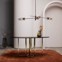 Load image into Gallery viewer, Axis Pendant Light in living room.
