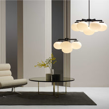 Load image into Gallery viewer, Cloudesley Chandelier in living room.
