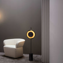 Load image into Gallery viewer, Pendulum LED Floor Lamp in living room.
