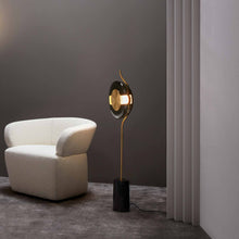 Load image into Gallery viewer, Pendulum LED Floor Lamp in living room.
