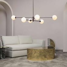 Load image into Gallery viewer, Trevi Pendant Light in living room.
