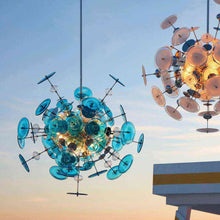 Load image into Gallery viewer, Avi Pendant Light in outsite area.
