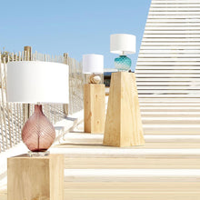 Load image into Gallery viewer, Ballard Table Lamp in Outside Area.
