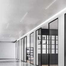 Load image into Gallery viewer, Boulevard LED Linear Pendant Light in office.
