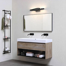 Load image into Gallery viewer, Borealis Curled LED Vanity Wall Light in bathroom.
