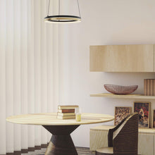 Load image into Gallery viewer, Eclipse LED Pendant Light in living room.
