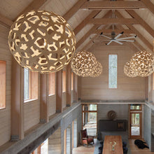 Load image into Gallery viewer, Coral XL Pendant Light in living room.
