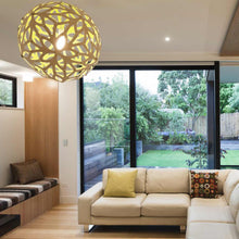 Load image into Gallery viewer, Floral Pendant Light in living room.
