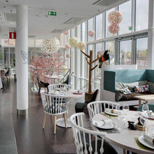 Load image into Gallery viewer, Floral XL Pendant Light in restaurant.
