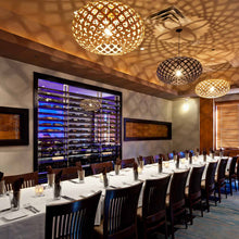 Load image into Gallery viewer, Kina Pendant Light in restaurant.
