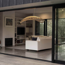 Load image into Gallery viewer, Navicula LED Pendant Light in living room.

