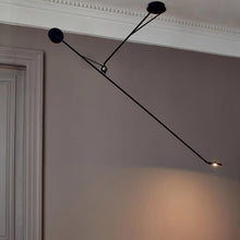 Load image into Gallery viewer, Aaro LED Pendant Light in living room.
