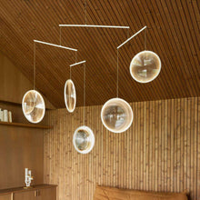 Load image into Gallery viewer, Focus LED Chandelier in living room.
